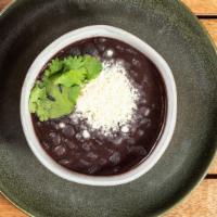 Frijoles Negro · Spicy black beans, queso fresco, cilantro