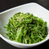 Seaweed Salad · Assorted seaweed and cucumber.