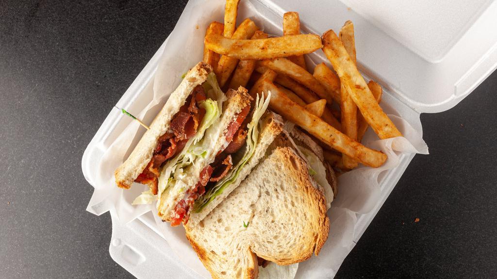 Blt Club Sandwich · Choice of turkey, cheeseburger or ham and cheese. Served between three pieces of white, wheat or dark rye toast with lettuce, tomato, bacon and mayo.