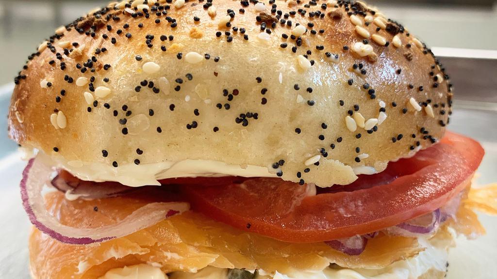 Classic Smoked Fish · Bagel with Nova Smoked Salmon, Plain Cream Cheese, Tomato, Red Onion and Capers.