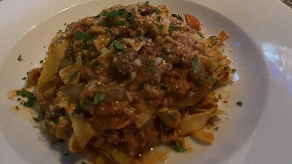 Bolognese Da Abruzzo · Handmade rigatoni pasta prepared with a typical abbruzzese style veal and beef ragout, enriched with pancetta and tomato.