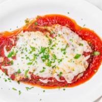 Chicken Parmigiana · Tender panko fried chicken breast topped with San Marzano tomatoes and mozzarella side of pa...