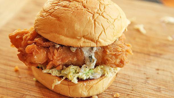 Fried Haddock Sand · Fresh haddock fried golden on a bulkie roll, topped with coleslaw and homemade tartar.