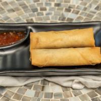 Crispy Veg Spring Roll · Two pcs homemade vegetable spring roll. Served with sweet chili sauce.