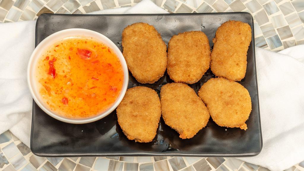 Veggie Nuggets · Six pieces fried vegan nuggets. Serve with sweet chili sauce.