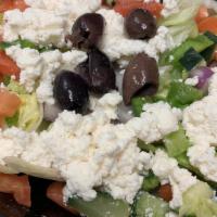 Greek Salad · Topped with feta cheese & Greek olives served in a garden salad. With your choice of dressin...