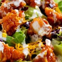 Chicken Finger Salad · Hand-breaded, fresh chicken tenders served on a garden salad. With your choice of dressing (...