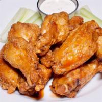 Wing Basket · Choose one of our signature flavors & served w/ crisp celery and a side of blue cheese or ra...