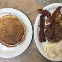 Big Breakfast Special  · Two pancakes, two eggs any styles, American bacon and sausage, home fries, and toast.