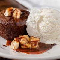 Chocolate Brownie Custard · Banana Rum Caramel Sauce, Vanilla Ice Cream