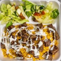 Combo Over Rice (Lamb & Chicken) · Served with rice, grilled onions, lettuce, tomato, cucumber and your choice of white sauce, ...