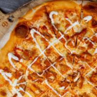 Buffalo Chicken · Grilled/Breaded Buffalo chicken over our traditional cheese pizza and finished with creamy b...