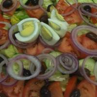 Green Garden Salad · Includes lettuce tomato cucumber green pepper onion black olives and egg. served with garlic...