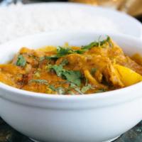 Chicken Vindaloo · Selected pieces of chicken cooked in sharply spiced tomato sauce.  Served with basmati rice.