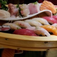 Sushi Sashimi For Two · Ten pieces sushi, 15 pieces sashimi, california roll, chef special roll.