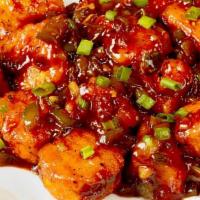 Paneer Manchurian · Slightly battered cottage cheese sauteed in onion garlic ginger Manchurian sauce.