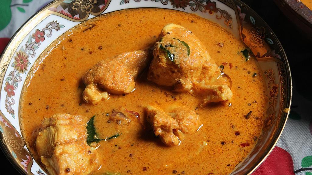 Malabar Fish Curry · Fish prepared with tomato, onion and coconut sauce.