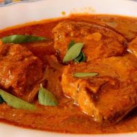 Fish Curry · Fish made in tangy and spices.