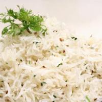 Jeera Rice · Long grain basmati rice flavored with cumin seeds.