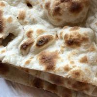 Plain Naan · Clay oven baked bread prepared fresh.