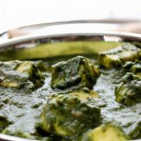 Saag Paneer · Finely cut garden-fresh spinach cooked with paneer & fresh herbs.