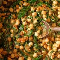 Chana Saag · Sauteed spinach cooked with chickpeas and spices.