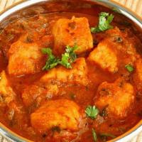 Paneer Vindaloo · Paneer cooked in tomatoes, onions, ginger, and spice.