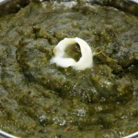 Plain Saag · Sauteed spinach cooked with tomatoes, onions, and spices.