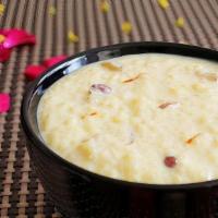 Rice Kheer · Sweet & cream pudding prepared with rice, milk, nuts, raisins &cardamom with a touch of Saff...
