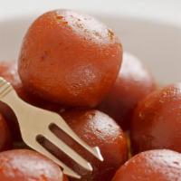 Gulab Jamun · Dry milk & cottage cheese balls fried & dipped in light sugar syrup.