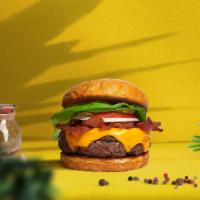 Breakin' Bacon Burger  · Seasoned plant-based patty topped with melted vegan cheese, layers of crispy vegan bacon, le...