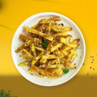 Go With Garlic Fries · (Vegetarian) Idaho potato fries cooked until golden brown and garnished with salt and garlic.