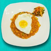 Big Bang Kimchi Fried Rice · Korean classic fried rice with kimchi, spicy seasoning and fried egg on top.