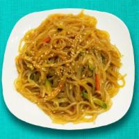 Classic Japchae · Vermicelli noodle stir fried with beef, onion, carrot, mushroom, green onion, zucchini.