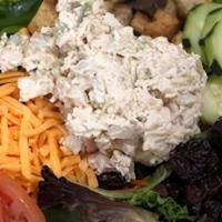 Grandmas Salad · MIXED GREENS, TOMATO, CUCUMBERS, CARROTS, ONIONS, TOPPED WITH TUNA & CHICKEN SALAD.