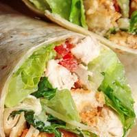 Chicken Caesar Wrap · GRILLED CHICKEN, PROVOLONE CHEESE, CRISP ROMAINE LETTUCE, TOMATO AND CAESAR DRESSING. SERVED...