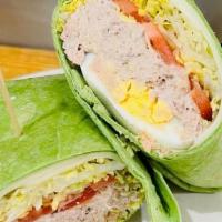 Wicked Tuna Wrap · TUNA SALAD, LETTUCE, TOMATO, AMERICAN CHEESE AND HARDBOILED EGG. SERVED ON YOUR CHOICE WRAP.