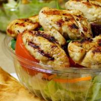 Chicken Caesar Salad (Regular) · Grilled chicken tenders over crisp romaine, seasoned croutons, creamy Caesar dressing, sprin...