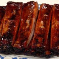 Bar-B-Que Spare Ribs · A cut of meat from the bottom section of the ribs.
