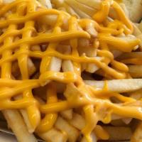 Cheese Fries · Shoestring fries topped with melted cheese.
