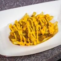 Chili Cheese Fries · Shoestring fries topped with chili and melted cheese.