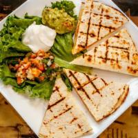 Quesadillas  (Shredded Or Grilled Meat) · Flour tortillas stuffed with jack cheese. Garnished with guacamole, sour cream and pico de g...