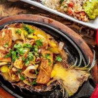 Hawaiian Fajita · Specialty. Pineapple with vegetables, served with Mexican rice, flour tortillas, refried bea...