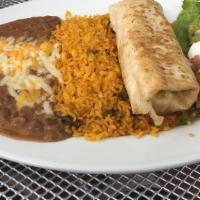 Chimichangas · Fried flour tortillas, Mexican rice, refried beans, lettuce, guacamole, sour cream and pico ...