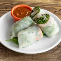 Summer Rolls · Mixed greens, rice noodles, bean sprouts, fresh herbs.  Served with a spicy peanut sauce.