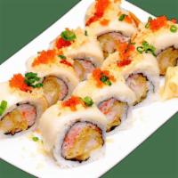 White Mountain Roll · Crabstick and shrimp tempura inside, topped with white tuna, tobiko, tempura flakes, scallio...