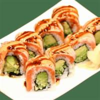 Torched Salmon Roll · Avocado and cucumber inside, topped with seared salmon, spicy mayo and eel sauce.
