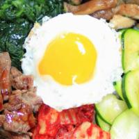 Bibimbap · Popular Korean rice dish with assorted vegetables.  Come with choice of protein.