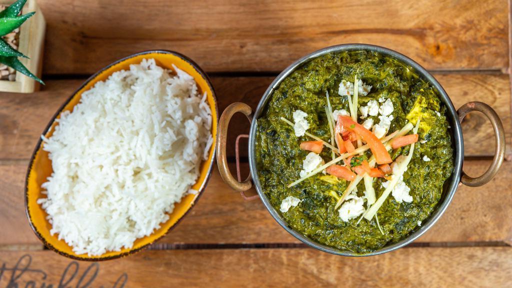 Saag Paneer · Homemade cheese cooked with fenugreek leaves and spinach.