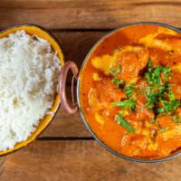 Chicken Makhini (Butter Chicken) · Clay oven chicken, cooked in a rich tomato cream sauce with mild spices. Chicken Makhini pop...